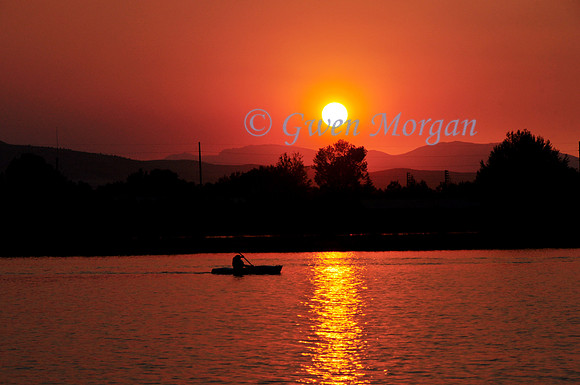 Canoe At Sunset